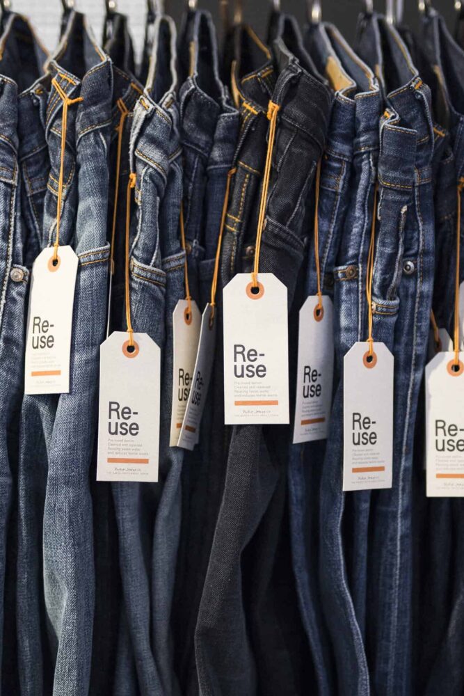 Nudie Jeans on a clothing rail with tags on